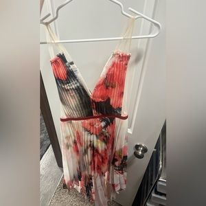 Bebe illusion straps and sides hi-low dress size small/6